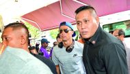 Portugal’s Cristiano Ronaldo (centre) arrives at Thomson Medical Hospital in Singapore to visit the daughter of billionaire Peter Lim yesterday.