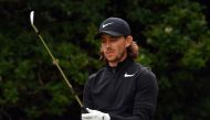 England's Tommy Fleetwood prepares to play his iron shot from the 5th tee during his second round on day two of the Open Golf Championship at Royal Birkdale golf course near Southport in north west England on July 21, 2017. (AFP / Ben STANSALL)