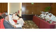 Qatar Chamber officials interacting with importers and other officials during the meeting.