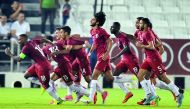 Qatari players celebrate after Sultan Al Barik scored against Syria in their final Group C match of the AFC U-23 Asian Cup Qualifiers at Jassim Bin Hamad Stadium yesterday. Picture by Kammutty VP / The Peninsula