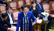 Japan’s Prime Minister Shinzo Abe answers questions during a budget committee meeting in the Upper House of parliament in Tokyo. For months Abe has been dogged by scandals.
