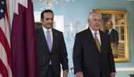 US Secretary of State Rex Tillerson with Qatari Foreign Minister H E Sheikh Mohammed Bin Abdulrahman Al Thani at the State Department, July 26, 2017 in Washington. (Drew Angerer/Getty Images/AFP)