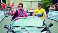 US actor Ronn Moss (left) and British cyclist Chris Froome ride in a car before the start of the 82nd edition of the ‘Natourcriterium Aalst’ cycling race in Aalst on Monday. 