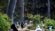 Tourists visit waterfalls at Ayn Athum in Salalah, Dhofar province, Oman August 23, 2016. Reuters/Ahmed Jadallah