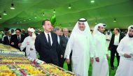 Minister of Municipality and Environment, H E Mohammed bin Abdullah Al Rumaihi, visiting the stalls after inaugurating the second Local Date Festival at Souq Waqif, yesterday. Pic: Baher Amin / The Peninsula