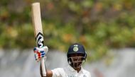India's cricketer Hardik Pandya celebrates his half century. (REUTERS/Dinuka Liyanawatte)
