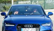 Barcelona's Brazilian forward Neymar (R) drives into the parkinglot to take part in a training session at the Sports Center FC Barcelona Joan Gamper in Sant Joan Despi, near Barcelona on August 2, 2017. (AFP / Josep LAGO)
