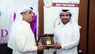 Dr Ibrahim Saleh Al Nuaimi (left), DICID Board Chairman, and Eng. Mohammed Mahdi Al Yami, Executive Director of Qatar Youth Hostels Association, at the event.
