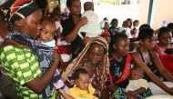 Women and their children visit a clinic at Sinza Health Centre in Tanzania capital Dar es Salaam, May 2, 2011 (REUTERS / Emmanuel Kwitema) 
