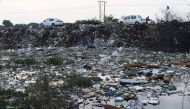 A picture taken on August 4, 2017, shows trash accumulated on the outskirts of Madhavnagar village, some 25kms from Ahmedabad, after heavy rains and floods. AFP / Sam Panthaky