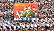 This picture taken on August 9, 2017 and released by North Korea's official Korean Central News Agency (KCNA) on August 10, 2017 shows a rally in support of North Korea's stance against the US, on Kim Il-Sung square in Pyongyang. (AFP PHOTO/KCNA VIA KNS)