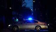 Police block streets near the location were a woman was killed and multiple people were injured when a car plowed into a crowd of anti-fascist counter-demonstrators marching near a downtown shopping area August 12, 2017 in Charlottesville, Virginia.Win Mc