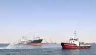 The container vessel Libra getting a water salute on reaching the Hamad Port.