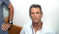 Israeli diamond magnate Beny Steinmetz arrives at the Israeli Rishon Lezion Justice court, near Tel Aviv on August 14, 2017. AFP / Jack Guez