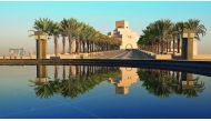 Trees line the approach to the Museum of Islamic Art buiding in Doha. 