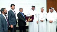 FPCCI President Zubair F Tufail (second left), receiving a memento from Qatar Chamber Vice-Chairman Mohammed bin Ahmed bin Towar Al Kuwari (centre) along with Pakistan Ambassador Shahzad Ahmad (left), Al Darwish United Group Chairman Yousuf bin Jassim Al 