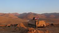 Members of the Lebanese army patrol in the rurals controlled after they hit the positions of Islamic State near the city of Ras Raalbek near Syria border in Lebanon on August 18, 2017.  ( Sleiman Amhaz - Anadolu Agency )
