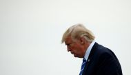 U.S. President Donald Trump steps from Air Force One upon his arrival in Morristown, New Jersey, U.S., after visiting Camp David in Maryland, August 18, 2017. REUTERS/Kevin Lamarque