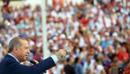 Turkish President Recep Tayyip Erdogan delivering a speech as he attends a meeting of ruling Justice and Development Party (AKP) in Denizli. AFP Photo / Turkish Presidential Press Service
