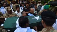 Pakistani Army personnel and members of the Marie Adelaide Leprosy Centre transport the coffin of Ruth Pfau, a German nun who devoted her life to combatting leprosy in Pakistan, to an ambulance during her funeral ceremony in Karachi on August 19, 2017. AF