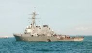 The John S. McCain, a guided-missile destroyer, seen after a collision, near Johor, Malaysia, on Monday. / Reuters.