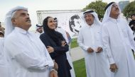 Qatar Museums (QM) Chairperson H E Sheikha Al Mayassa bint Hamad bin Khalifa Al Thani with other officials during the opening night tour of the “Tamim Al Majd: Celebration of Unity” exhibition at MIA Park, yesterday.