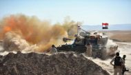 Iraqi army fire against Islamic State militants on the outskirts of Tal Afar, Iraq, August 20, 2017. REUTERS/Stringer 
