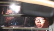 Student leader Joshua Wong leaves the High Court in a prison van after his sentencing on charges related to the 2014 pro-democracy Umbrella Movement, also known as Occupy Central protests, in Hong Kong, China August 17, 2017. Apple Daily/Tse Wing Yiu via 