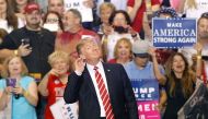 ECHO CHAMBER. U.S. President Donald Trump gestures during a rally at the Phoenix Convention Center on August 22, 2017 in Phoenix, Arizona. Ralph Freso/Getty Images/AFP.