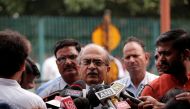 Prashant Bhushan, a senior lawyer, speaks with the media after a verdict on right to privacy outside the Supreme Court in New Delhi, India August 24, 2017. (REUTERS/Adnan Abidi)