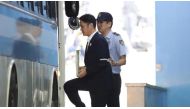 Samsung Group heir Lee Jae-yong leaves court in Seoul after being sentenced to five years in prison. (Chung Sung-jun / AFP).