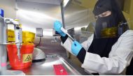 A Qatar University researcher at the lab.