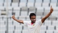 Bangladeshi cricketer Shakib Al Hasan reacts after the dismisal of Australian cricketer Matt Renshaw during the second day of the first Test cricket match between Bangladesh and Australia at the Sher-e-Bangla National Cricket Stadium in Dhaka on August 28