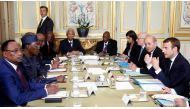 Leaders at the Paris summit will focus on the central Mediterranean route [Thibault Camus/Reuters].