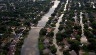 Houses are seen partially submerged in flood waters caused by Tropical Storm Harvey in Northwest Houston, Texas, U.S. August 30, 2017. Picture taken August 30, 2017. REUTERS/Adrees Latif
