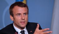 French President Emmanuel Macron (L) gives a press conference with Luxembourg's and Belgium's Prime Minister at Senningen Castle in Luxembourg on August 29, 2017. / AFP / Christian LIEWIG
