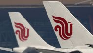 Flights of Air China are parked on the tarmac of Beijing Capital International Airport in Beijing, China, March 28, 2016.REUTERS/Kim Kyung-Hoon/File Photo 