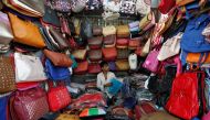 A vendor arranges bags as he waits for customers at his shop at a market in Mumbai, January 6, 2017. (REUTERS / Danish Siddiqui) 
