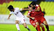 Qatar’s Ali Assadalla (left) vies for the ball possession against Syria’s Zaher Al Medani and Tamer Hag Mohamad (right) during their Group A 2018 World Cup qualifier played at Hang Jebat Stadium in Melaka, Malaysia yesterday. Syria notched up a 3-1 win to