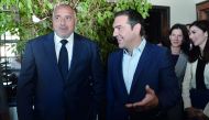Greek Prime Minister Alexis Tsipras (R) and his Bulgarian counterpart Boyko Borissov (L) are pictured following the signing of a bilateral agreement to speed up the planned construction of a railway network that will connect Black Sea ports with those of 