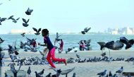 A child is seen having fun at Doha Corniche. Pic: Baher Amin / The Peninsula 