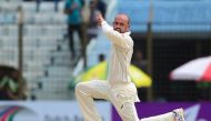 Australian cricketer Nathan Lyon appeals unsuccessfully for a leg before wicket decision against Bangladeshi cricketer Nasir Hossain during the second day of the second cricket Test match between Bangladesh and Australia at Zahur Ahmed Chowdhury Stadium i