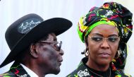 President Robert Mugabe (L) and his wife Grace attend a rally of his ruling ZANU (PF) in Chinhoyi, Zimbabwe, July 29, 2017. 
