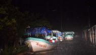 Secured boats are seen under pouring rain caused by Hurricane Katia in Tecolutla, Veracruz state, Mexico on September 8, 2017. AFP / YURI CORTEZ
