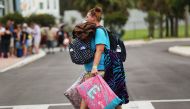 People arrive at a shelter at Alico Arena where thousands of Floridians are hoping to ride out Hurricane Irma on September 9, 2017 in Fort Myers, Florida. The Fort Myers area could begin to feel hurricane-force winds from Irma by 11 a.m. Sunday and experi