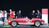 Ferrari’s CEO Sergio Marchionne (second right) and chairman of Fiat Chrysler Automobiles John Elkann (right) are seen during the celebrations of 70th anniversary of the Ferrari brand in Maranello, Italy, yesterday.