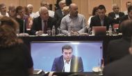 Greek Prime Minister Alexis Tsipras (right) speaks during a press conference at the Thessaloniki International Fair (TIF) in Thessaloniki, northern Greece, yesterday. Tsipras said attracting investment was a priority for his leftist-led government.