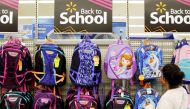 File Photo of a woman shoping for back to school supplies at a Walmart store in San Diego, August 6, 2015 (REUTERS / Mike Blake) 