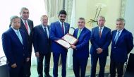 President of the Qatar Olympic Committee (QOC), H E Sheikh Joaan bin Hamad Al Thani making a donation to the Olympic Refugee Foundation, accepted by International Olympic Committee (IOC) President Thomas Bach during the launch of the Foundation in Lima, P