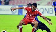 Al Arabi and Al Sailiyah players vie for the ball possession during their opening match of the 2017 QNB Stars League season at Al Arabi Stadium on Saturday.